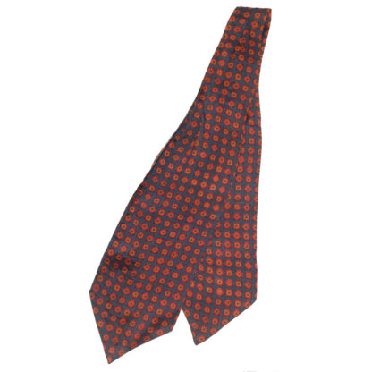 Red design on a blue background rayon cravat