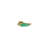 Gold tone tie pin with green stone decoration