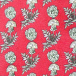 Jaeger red background silk tie with a design of a thistle type flower