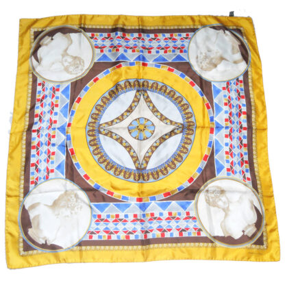 Silk scarf with hand rolled edges and a gold border with a classic central design in grey, blue and red.