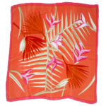 Marja Kurki silk square withan orange background, a pin border and a fbright floral design