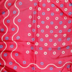 Red silk scarf with small blue and cream circle design