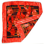 Orange and white border silk scarf wiht a central deisgn in ornage black and brown