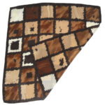 Hand rolled edge silk scarf with adesign in shades of brown and cream
