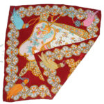 Xiang Mei fan design silk scarf with a dark red border and the central design in shades of pink, blue and gold
