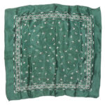 Dark green background silk pocket square with a black and white design