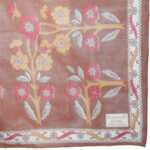 Liberty of London all cotton scarf with a brown, red and ochre design