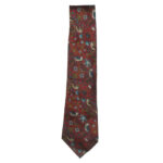 Liberty bird and flower design on a dark red background silk tie