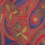 Liberty silk tie with a large paisley design in in brown, blue and yellow