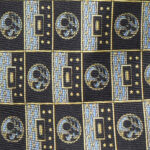 Bugatti , Italy,silk tie with a blue and gold design