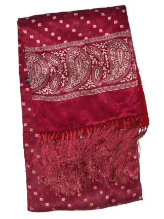Long dark red scarf which is patterned silk with a paisley border one side and plain wool the other