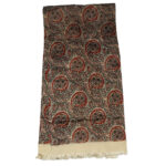 Vintage long rayon acetate scarf with a detailed design on a pale gold background