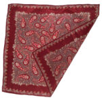 Maroon paisley and flower design scarf with rolled edges
