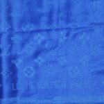 Louis Vuitton blue wool shawl with the LV logo repeated