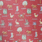 Cattani, Milano Italy, dark red background silk tie with a design of animals, birds and trees