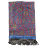 Long silk evening scrf with a blue background and border and a red, yellow and green design