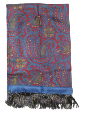 Long silk evening scrf with a blue background and border and a red, yellow and green design