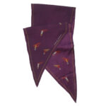 Charles Jourdan long silk scarf with a design of lipstick covered lips smoking a cigarette on a purple background