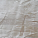 Louis Vuitton pale gold logo repeat wool shawl