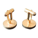 Gold tone metal vintage round cufflinks