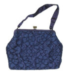Salisburys blue lace evening bag with cream satin lining