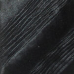 Christensen black silk tie with pleated diagonal stripes
