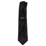 Christensen black silk tie with pleated diagonal stripes