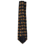 Yves Saint Laurent silk tie with a dark blue background and an abstract design in yellow, red and grey.