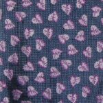 ves Saint LAlurent silk tie with a navy background and a small mauve leaf design